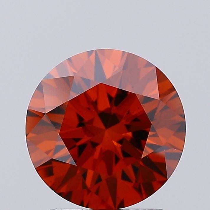 Ideal Loose Diamond - ROUND 1.96ct Fancy Vivid Orange VS2: Ideal Loose Diamond - ROUND 1.96ct Fancy Vivid Orange VS2 Source: This is a real non-mined Diamond that has been grown in a lab Shape: ROUND Carats: 1.96 Color: Fancy Vivid Orange Certification: IGI V