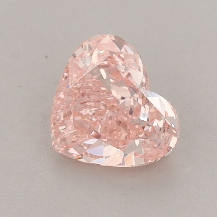 Loose Diamond - HEART 0.84ct Fancy Vivid Pink VS1: Loose Diamond - HEART 0.84ct Fancy Vivid Pink VS1 Source: This is a real non-mined Diamond that has been grown in a lab Shape: HEART Carats: 0.84 Color: Fancy Vivid Pink Certification: IGI Additional 