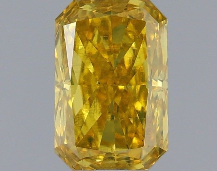 Loose Diamond - RADIANT 0.74ct Fancy Vivid Yellow VS2: Loose Diamond - RADIANT 0.74ct Fancy Vivid Yellow VS2 Source: This is a real non-mined Diamond that has been grown in a lab Shape: RADIANT Carats: 0.74 Color: Fancy Vivid Yellow Certification: IGI Vid