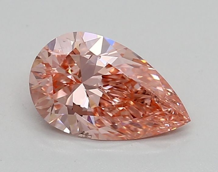 Loose Diamond - PEAR 0.91ct Fancy Vivid Pink SI1: Loose Diamond - PEAR 0.91ct Fancy Vivid Pink SI1 Source: This is a real non-mined Diamond that has been grown in a lab Shape: PEAR Carats: 0.91 Color: Fancy Vivid Pink Certification: IGI Video:
