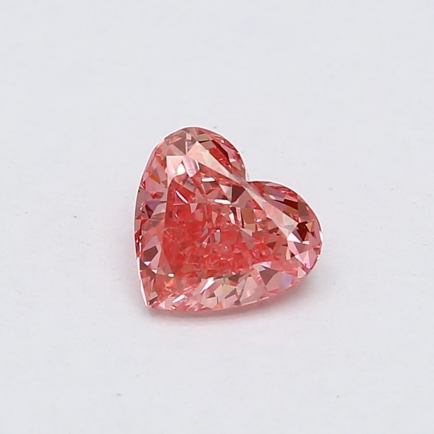 Loose Diamond - HEART 0.98ct Fancy Vivid Pink VS1: Loose Diamond - HEART 0.98ct Fancy Vivid Pink VS1 Source: This is a real non-mined Diamond that has been grown in a lab Shape: HEART Carats: 0.98 Color: Fancy Vivid Pink Certification: NONE Video: