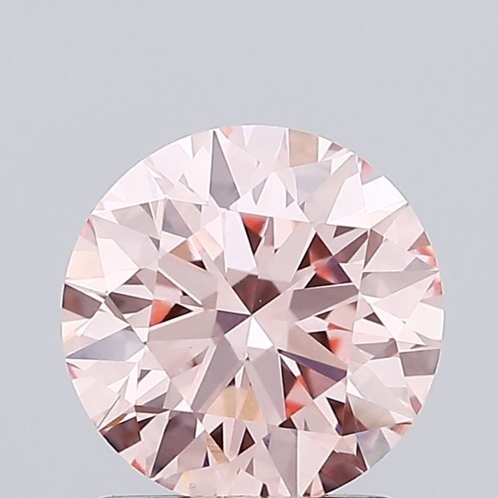 Loose Diamond - ROUND 0.28ct Fancy Vivid Pink VVS2: Loose Diamond - ROUND 0.28ct Fancy Vivid Pink VVS2 Source: This is a real non-mined Diamond that has been grown in a lab Shape: ROUND Carats: 0.28 Color: Fancy Vivid Pink Certification: NONE Video: