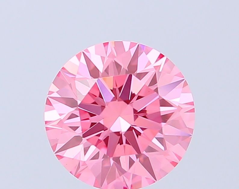 Ideal Loose Diamond - ROUND 1.59ct Fancy Vivid Pink VVS2: Ideal Loose Diamond - ROUND 1.59ct Fancy Vivid Pink VVS2 Source: This is a real non-mined Diamond that has been grown in a lab Shape: ROUND Carats: 1.59 Color: Fancy Vivid Pink Certification: IGI Vide