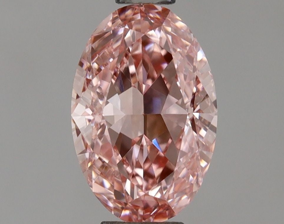 Loose Diamond - OVAL 1.09ct Fancy Vivid Pink VVS2: Loose Diamond - OVAL 1.09ct Fancy Vivid Pink VVS2 Source: This is a real non-mined Diamond that has been grown in a lab Shape: OVAL Carats: 1.09 Color: Fancy Vivid Pink Certification: IGI Video: