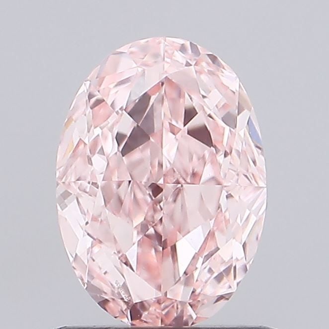 Loose Diamond - OVAL 0.99ct Fancy Vivid Pink VVS2: Loose Diamond - OVAL 0.99ct Fancy Vivid Pink VVS2 Source: This is a real non-mined Diamond that has been grown in a lab Shape: OVAL Carats: 0.99 Color: Fancy Vivid Pink Certification: IGI Video: