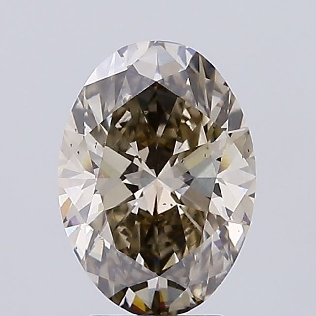 Loose Diamond - OVAL 3.0ct Fancy Light Brown SI1: Loose Diamond - OVAL 3.0ct Fancy Light Brown SI1 Source: This is a real non-mined Diamond that has been grown in a lab Shape: OVAL Carats: 3.0 Color: Fancy Light Brown Certification: IGI Video: