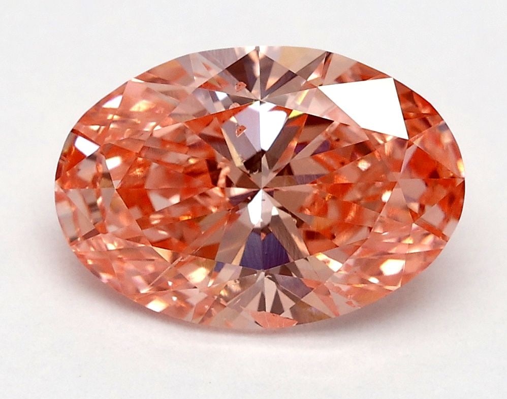 Loose Diamond - OVAL 1.8ct Fancy Vivid Pink SI1: Loose Diamond - OVAL 1.8ct Fancy Vivid Pink SI1 Source: This is a real non-mined Diamond that has been grown in a lab Shape: OVAL Carats: 1.8 Color: Fancy Vivid Pink Certification: IGI Video: Video