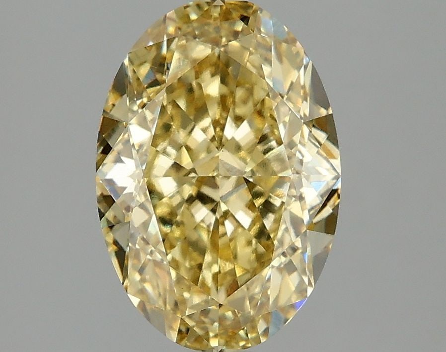 Loose Diamond - OVAL 3.08ct Fancy Vivid Yellow VS1: Loose Diamond - OVAL 3.08ct Fancy Vivid Yellow VS1 Source: This is a real non-mined Diamond that has been grown in a lab Shape: OVAL Carats: 3.08 Color: Fancy Vivid Yellow Certification: IGI Video: