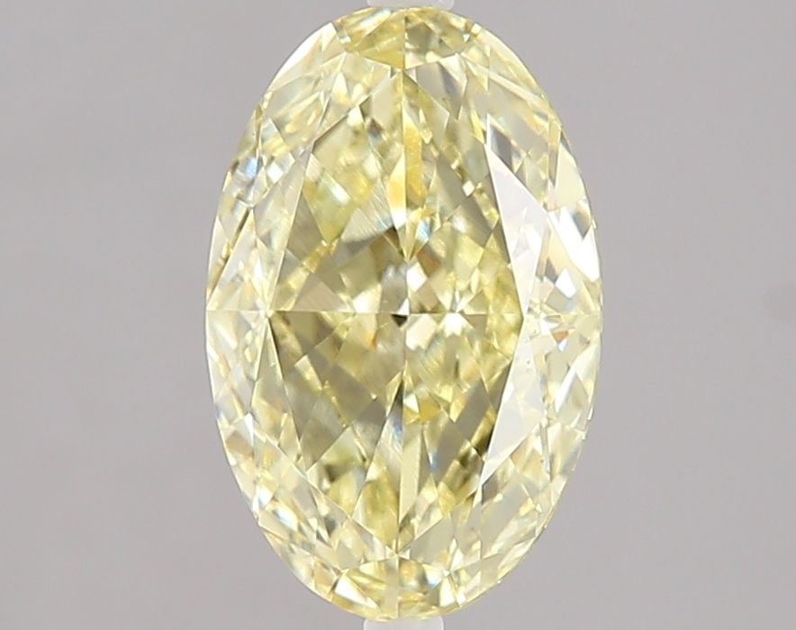 Loose Diamond - OVAL 2.01ct Fancy Yellow VS1: Loose Diamond - OVAL 2.01ct Fancy Yellow VS1 Source: This is a real non-mined Diamond that has been grown in a lab Shape: OVAL Carats: 2.01 Color: Fancy Yellow Certification: IGI Video:
