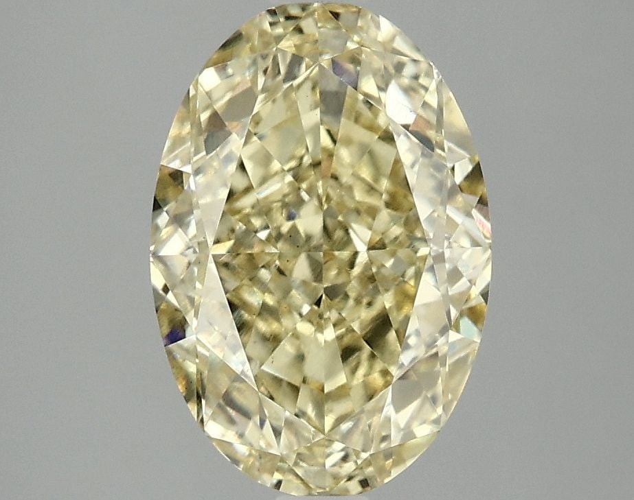 Loose Diamond - OVAL 3.1ct Fancy Vivid Yellow VS1: Loose Diamond - OVAL 3.1ct Fancy Vivid Yellow VS1 Source: This is a real non-mined Diamond that has been grown in a lab Shape: OVAL Carats: 3.1 Color: Fancy Vivid Yellow Certification: IGI Video: