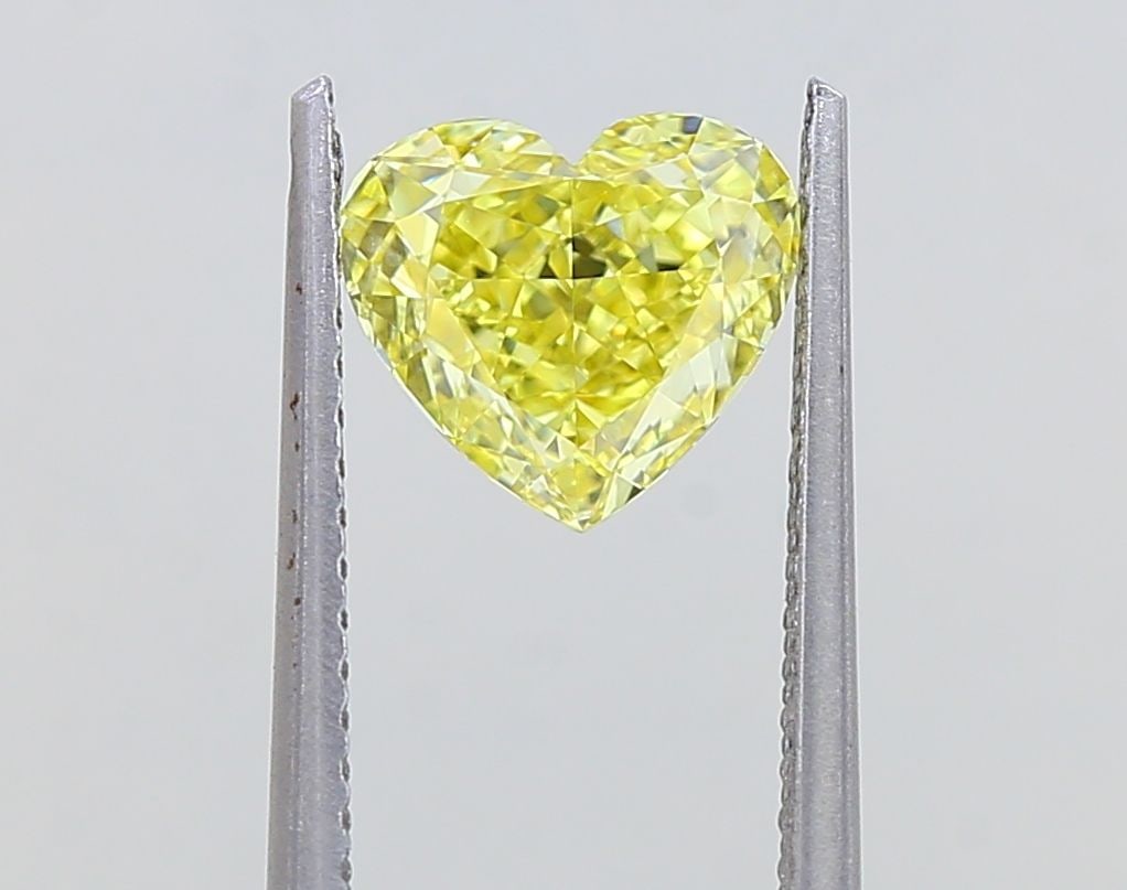 Loose Diamond - HEART 1.36ct Fancy Intense Yellow VS1: Loose Diamond - HEART 1.36ct Fancy Intense Yellow VS1 Source: This is a real non-mined Diamond that has been grown in a lab Shape: HEART Carats: 1.36 Color: Fancy Intense Yellow Certification: IGI Vid