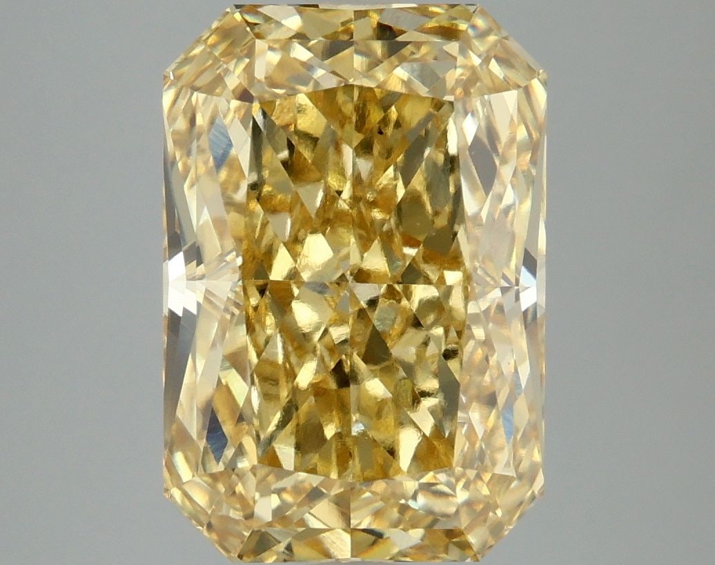 Loose Diamond - RADIANT 5.1ct Fancy Vivid Yellow VS1: Loose Diamond - RADIANT 5.1ct Fancy Vivid Yellow VS1 Source: This is a real non-mined Diamond that has been grown in a lab Shape: RADIANT Carats: 5.1 Color: Fancy Vivid Yellow Certification: IGI Video