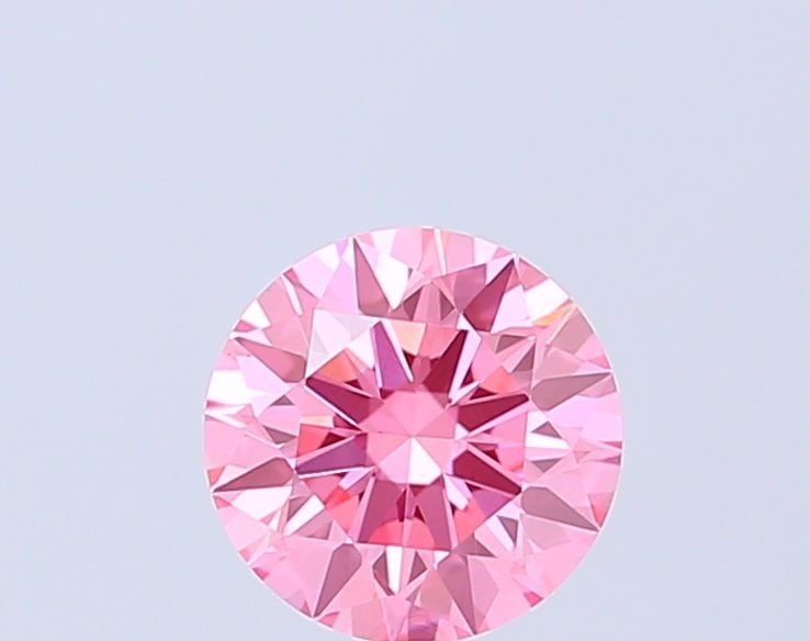Ideal Loose Diamond - ROUND 1.1ct Fancy Vivid Pink VS1: Ideal Loose Diamond - ROUND 1.1ct Fancy Vivid Pink VS1 Source: This is a real non-mined Diamond that has been grown in a lab Shape: ROUND Carats: 1.1 Color: Fancy Vivid Pink Certification: IGI Video: