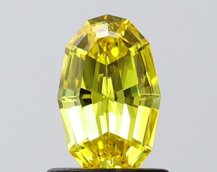Loose Diamond - OVAL 0.88ct Fancy Vivid Yellow VVS1: Loose Diamond - OVAL 0.88ct Fancy Vivid Yellow VVS1 Source: This is a real non-mined Diamond that has been grown in a lab Shape: OVAL Carats: 0.88 Color: Fancy Vivid Yellow Certification: IGI Video: