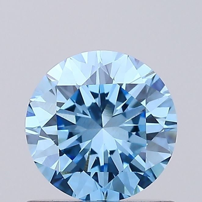 Loose Diamond - ROUND 0.79ct Fancy Vivid Blue VVS2: Loose Diamond - ROUND 0.79ct Fancy Vivid Blue VVS2 Source: This is a real non-mined Diamond that has been grown in a lab Shape: ROUND Carats: 0.79 Color: Fancy Vivid Blue Certification: IGI Video: