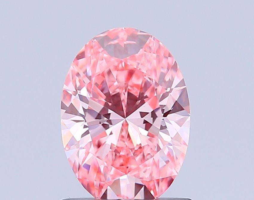 Loose Diamond - OVAL 1.0ct Fancy Vivid Pink VS1: Loose Diamond - OVAL 1.0ct Fancy Vivid Pink VS1 Source: This is a real non-mined Diamond that has been grown in a lab Shape: OVAL Carats: 1.0 Color: Fancy Vivid Pink Certification: IGI Video: