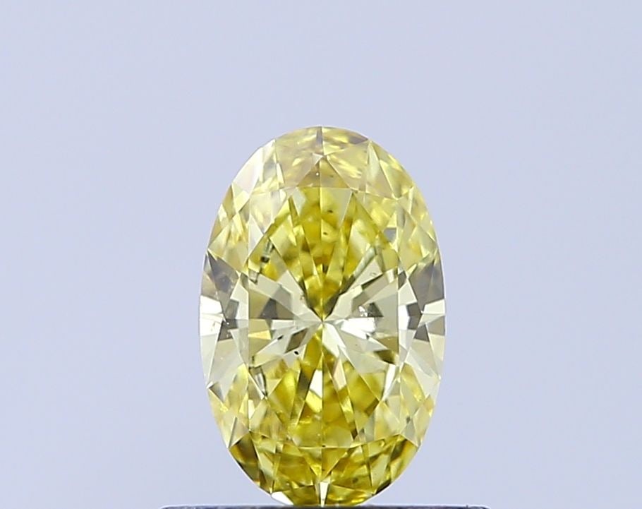 Loose Diamond - OVAL 0.5ct Fancy Vivid Yellow VS2: Loose Diamond - OVAL 0.5ct Fancy Vivid Yellow VS2 Source: This is a real non-mined Diamond that has been grown in a lab Shape: OVAL Carats: 0.5 Color: Fancy Vivid Yellow Certification: IGI Video: