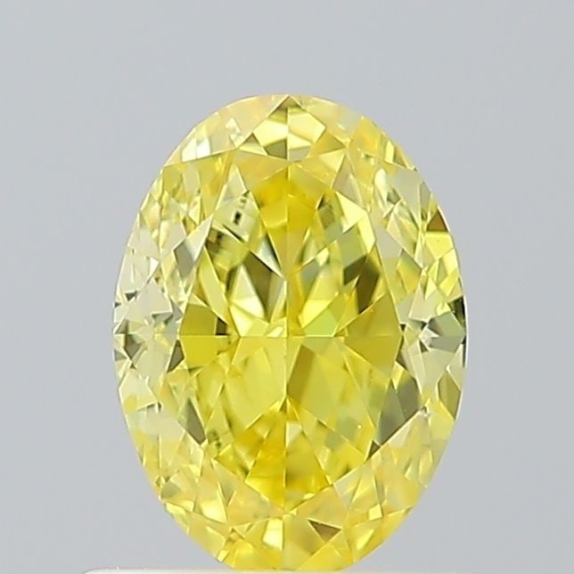 Loose Diamond - OVAL 1.07ct Fancy Vivid Yellow VS2: Loose Diamond - OVAL 1.07ct Fancy Vivid Yellow VS2 Source: This is a real non-mined Diamond that has been grown in a lab Shape: OVAL Carats: 1.07 Color: Fancy Vivid Yellow Certification: IGI Video: