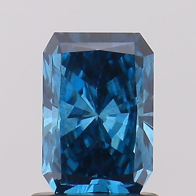 Loose Diamond - RADIANT 0.95ct Fancy Vivid Blue SI2: Loose Diamond - RADIANT 0.95ct Fancy Vivid Blue SI2 Source: This is a real non-mined Diamond that has been grown in a lab Shape: RADIANT Carats: 0.95 Color: Fancy Vivid Blue Certification: NONE
