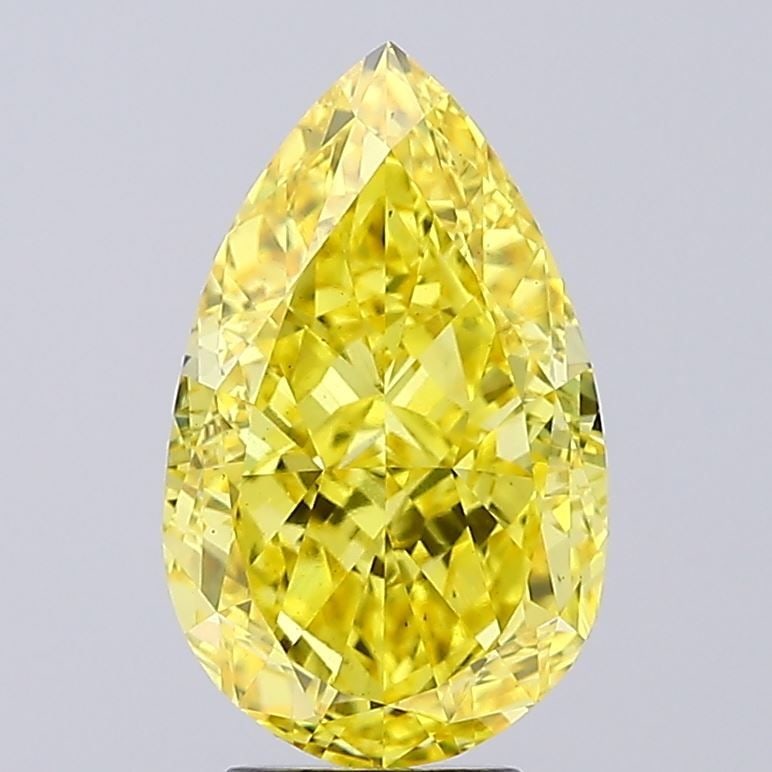 Loose Diamond - PEAR 6.07ct Fancy Vivid Yellow VS2: Loose Diamond - PEAR 6.07ct Fancy Vivid Yellow VS2 Source: This is a real non-mined Diamond that has been grown in a lab Shape: PEAR Carats: 6.07 Color: Fancy Vivid Yellow Certification: IGI Video: