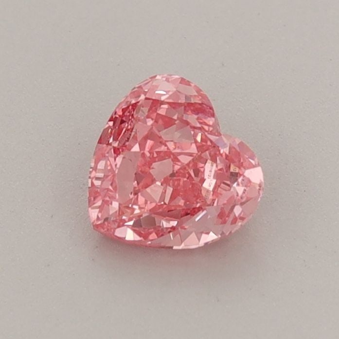 Loose Diamond - HEART 0.51ct Fancy Vivid Pink VS1: Loose Diamond - HEART 0.51ct Fancy Vivid Pink VS1 Source: This is a real non-mined Diamond that has been grown in a lab Shape: HEART Carats: 0.51 Color: Fancy Vivid Pink Certification: IGI Video: