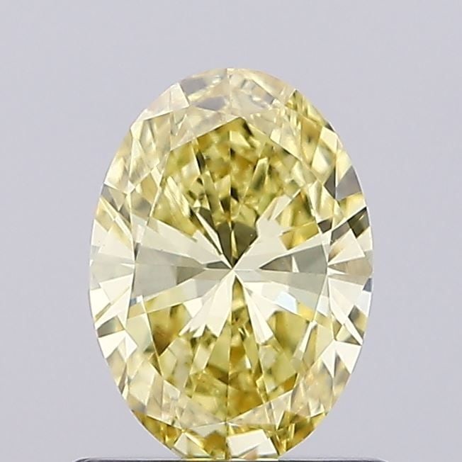 Loose Diamond - OVAL 0.65ct Fancy Vivid Yellow VS1: Loose Diamond - OVAL 0.65ct Fancy Vivid Yellow VS1 Source: This is a real non-mined Diamond that has been grown in a lab Shape: OVAL Carats: 0.65 Color: Fancy Vivid Yellow Certification: NONE Video: