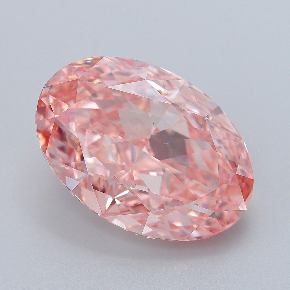 Loose Diamond - OVAL 16.68ct Fancy Vivid Pink VS2: Loose Diamond - OVAL 16.68ct Fancy Vivid Pink VS2 Source: This is a real non-mined Diamond that has been grown in a lab Shape: OVAL Carats: 16.68 Color: Fancy Vivid Pink Certification: IGI Additional 