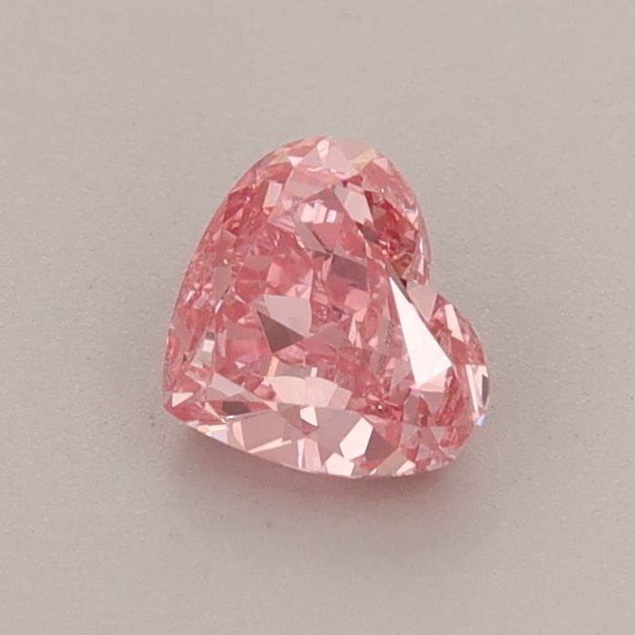 Loose Diamond - HEART 0.58ct Fancy Vivid Pink VS1: Loose Diamond - HEART 0.58ct Fancy Vivid Pink VS1 Source: This is a real non-mined Diamond that has been grown in a lab Shape: HEART Carats: 0.58 Color: Fancy Vivid Pink Certification: IGI Additional 