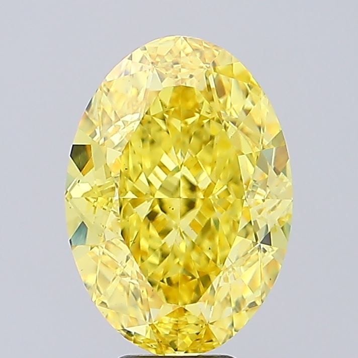 Loose Diamond - OVAL 7.01ct Fancy Vivid Yellow VS2: Loose Diamond - OVAL 7.01ct Fancy Vivid Yellow VS2 Source: This is a real non-mined Diamond that has been grown in a lab Shape: OVAL Carats: 7.01 Color: Fancy Vivid Yellow Certification: IGI Video: