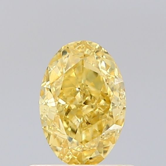 Loose Diamond - OVAL 0.74ct Fancy Vivid Yellow VVS2: Loose Diamond - OVAL 0.74ct Fancy Vivid Yellow VVS2 Source: This is a real non-mined Diamond that has been grown in a lab Shape: OVAL Carats: 0.74 Color: Fancy Vivid Yellow Certification: IGI Video: