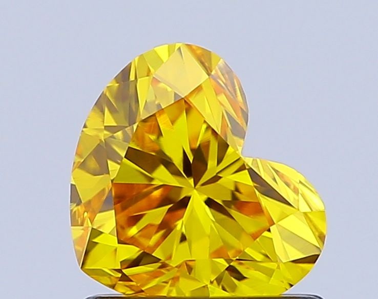 Loose Diamond - HEART 1.01ct Fancy Vivid Yellow VVS2: Loose Diamond - HEART 1.01ct Fancy Vivid Yellow VVS2 Source: This is a real non-mined Diamond that has been grown in a lab Shape: HEART Carats: 1.01 Color: Fancy Vivid Yellow Certification: IGI Video: