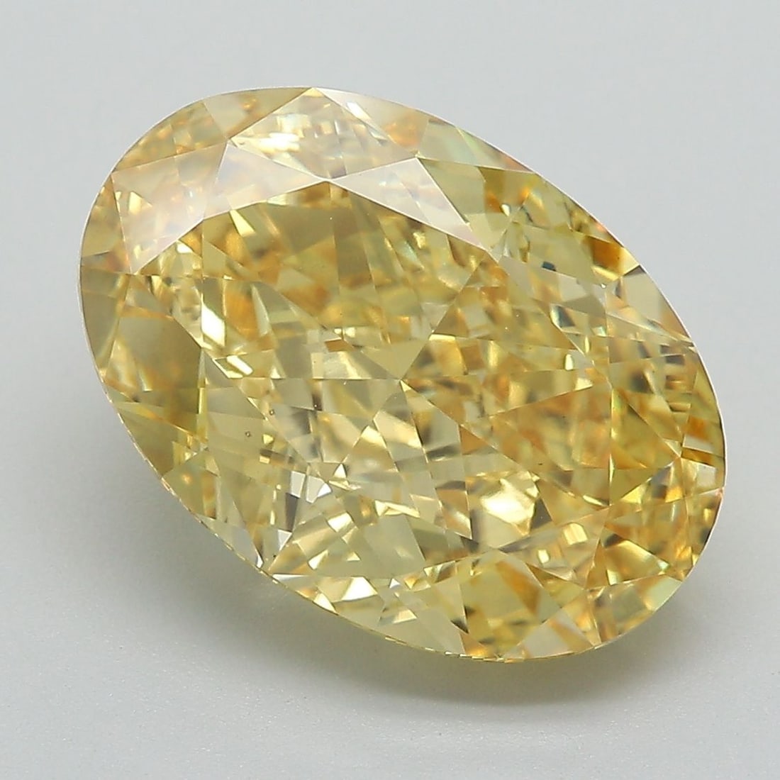 Loose Diamond - OVAL 7.19ct Fancy Vivid Yellow VS1: Loose Diamond - OVAL 7.19ct Fancy Vivid Yellow VS1 Source: This is a real non-mined Diamond that has been grown in a lab Shape: OVAL Carats: 7.19 Color: Fancy Vivid Yellow Certification: IGI Video: