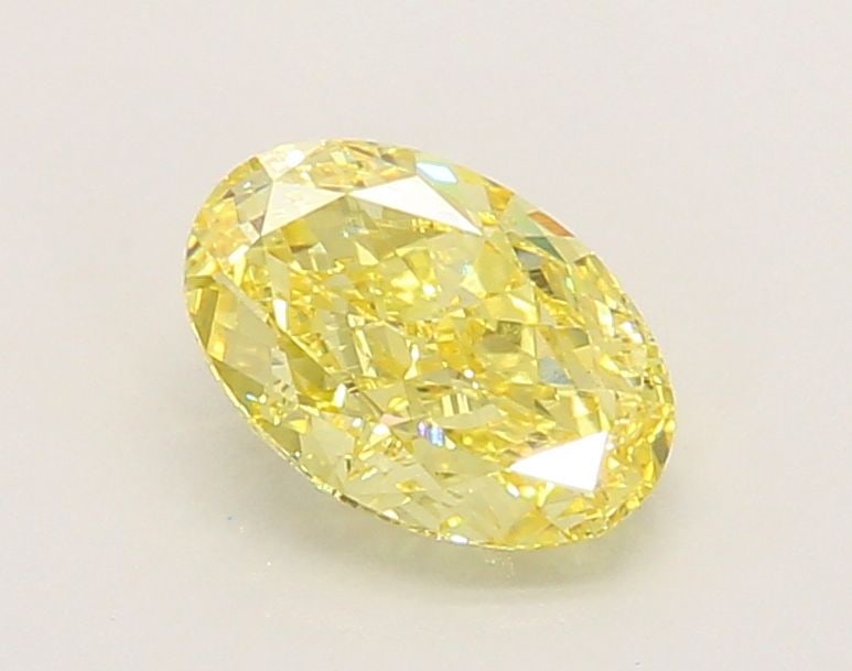 Loose Diamond - OVAL 1.3ct Fancy Vivid Yellow VS1: Loose Diamond - OVAL 1.3ct Fancy Vivid Yellow VS1 Source: This is a real non-mined Diamond that has been grown in a lab Shape: OVAL Carats: 1.3 Color: Fancy Vivid Yellow Certification: IGI Video: