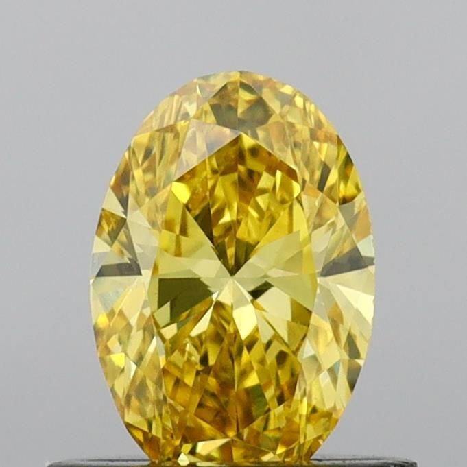 Loose Diamond - OVAL 0.57ct Fancy Vivid Yellow VS1: Loose Diamond - OVAL 0.57ct Fancy Vivid Yellow VS1 Source: This is a real non-mined Diamond that has been grown in a lab Shape: OVAL Carats: 0.57 Color: Fancy Vivid Yellow Certification: IGI Video: