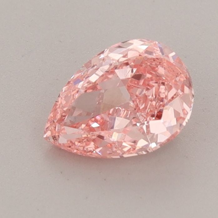 Loose Diamond - PEAR 0.85ct Fancy Vivid Pink VS1: Loose Diamond - PEAR 0.85ct Fancy Vivid Pink VS1 Source: This is a real non-mined Diamond that has been grown in a lab Shape: PEAR Carats: 0.85 Color: Fancy Vivid Pink Certification: IGI Video: