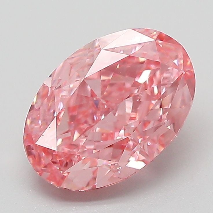 Loose Diamond - OVAL 2.1ct Fancy Vivid Pink VVS2: Loose Diamond - OVAL 2.1ct Fancy Vivid Pink VVS2 Source: This is a real non-mined Diamond that has been grown in a lab Shape: OVAL Carats: 2.1 Color: Fancy Vivid Pink Certification: IGI Additional ima