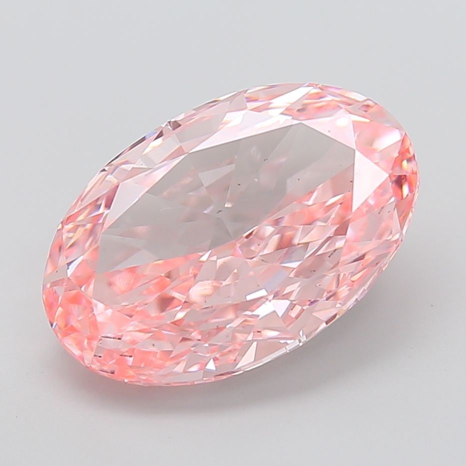 Loose Diamond - OVAL 10.04ct Fancy Vivid Pink VS2: Loose Diamond - OVAL 10.04ct Fancy Vivid Pink VS2 Source: This is a real non-mined Diamond that has been grown in a lab Shape: OVAL Carats: 10.04 Color: Fancy Vivid Pink Certification: IGI Additional 