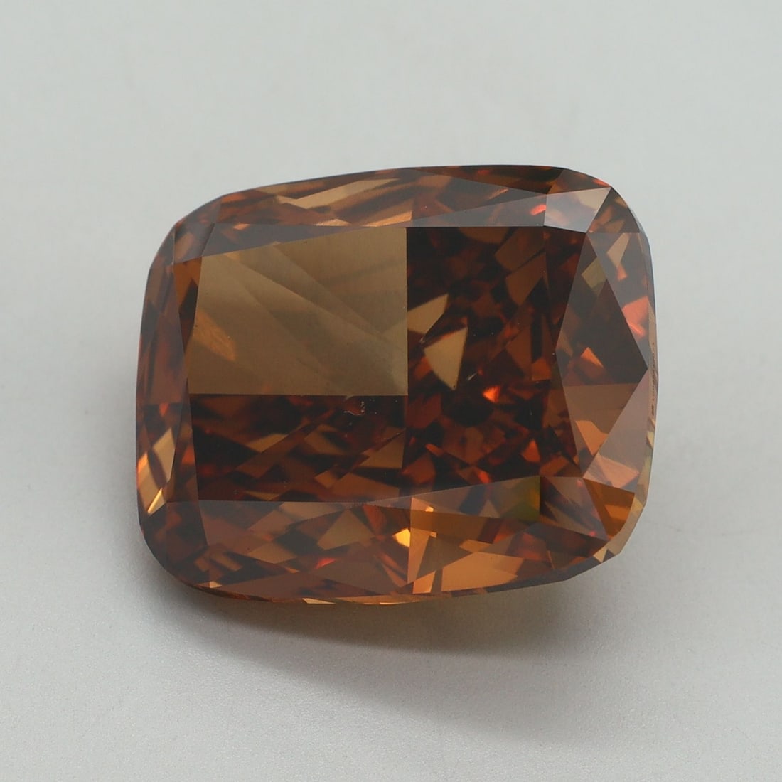Loose Diamond - CUSHION MODIFIED 14.03ct Fancy Vivid Orange VS1: Loose Diamond - CUSHION MODIFIED 14.03ct Fancy Vivid Orange VS1 Source: This is a real non-mined Diamond that has been grown in a lab Shape: CUSHION MODIFIED Carats: 14.03 Color: Fancy Vivid Orange Ce