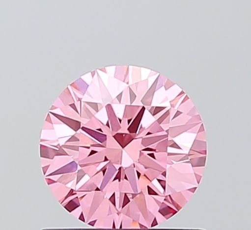 Ideal Loose Diamond - ROUND 0.74ct Fancy Vivid Pink VS1: Ideal Loose Diamond - ROUND 0.74ct Fancy Vivid Pink VS1 Source: This is a real non-mined Diamond that has been grown in a lab Shape: ROUND Carats: 0.74 Color: Fancy Vivid Pink Certification: IGI Video