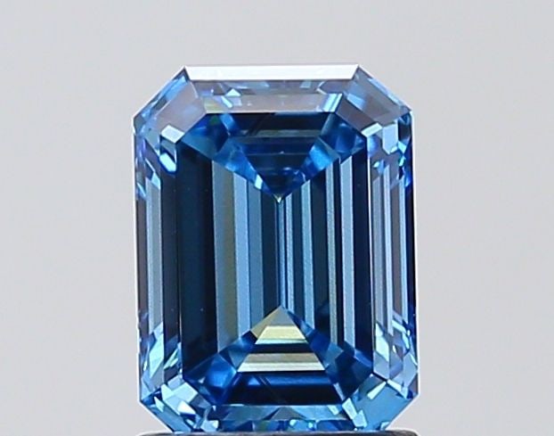 Loose Diamond - EMERALD 1.59ct Fancy Vivid Blue VS2: Loose Diamond - EMERALD 1.59ct Fancy Vivid Blue VS2 Source: This is a real non-mined Diamond that has been grown in a lab Shape: EMERALD Carats: 1.59 Color: Fancy Vivid Blue Certification: IGI Video: