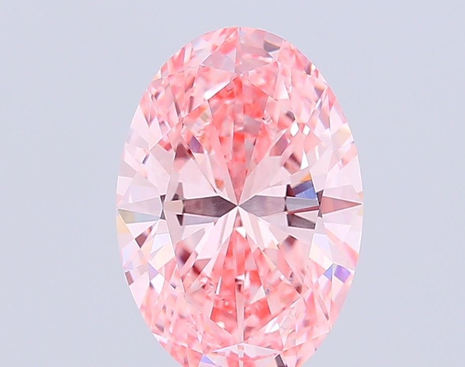 Loose Diamond - OVAL 11.2ct Fancy Vivid Pink VVS2: Loose Diamond - OVAL 11.2ct Fancy Vivid Pink VVS2 Source: This is a real non-mined Diamond that has been grown in a lab Shape: OVAL Carats: 11.2 Color: Fancy Vivid Pink Certification: IGI Video: