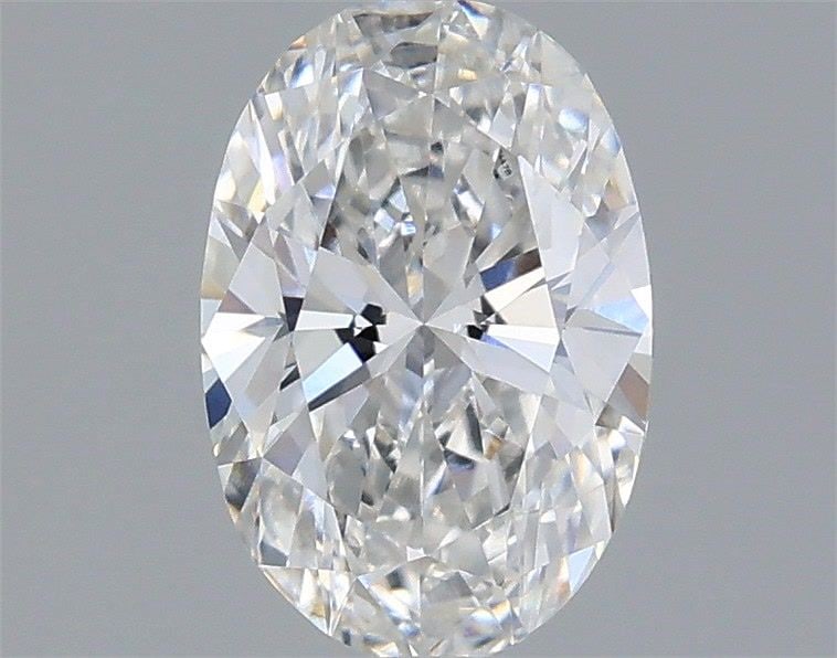 Loose Diamond - OVAL 0.7ct E VS1: Loose Diamond - OVAL 0.7ct E VS1 Source: This is a real non-mined Diamond that has been grown in a lab Shape: OVAL Carats: 0.7 Color: E Clarity: VS1 Certification: IGI Video: