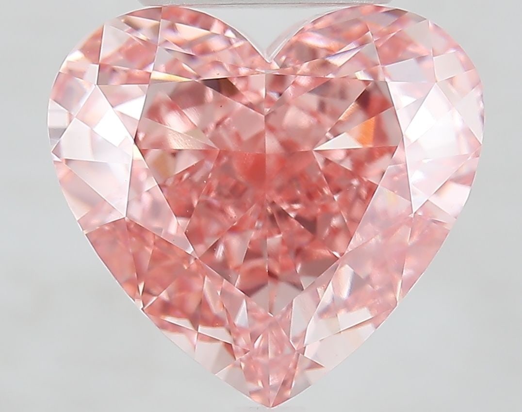Loose Diamond - HEART 9.06ct Fancy Vivid Pink VS1: Loose Diamond - HEART 9.06ct Fancy Vivid Pink VS1 Source: This is a real non-mined Diamond that has been grown in a lab Shape: HEART Carats: 9.06 Color: Fancy Vivid Pink Certification: IGI Video: