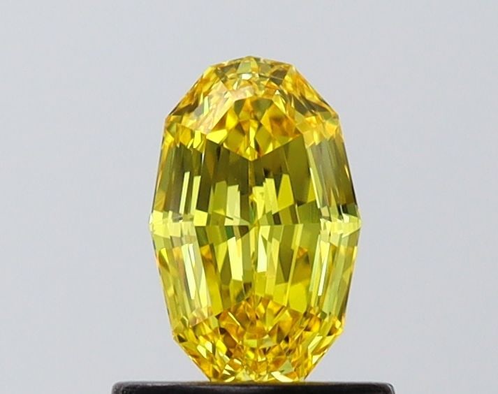 Loose Diamond - OVAL 0.74ct Fancy Vivid Yellow VVS2: Loose Diamond - OVAL 0.74ct Fancy Vivid Yellow VVS2 Source: This is a real non-mined Diamond that has been grown in a lab Shape: OVAL Carats: 0.74 Color: Fancy Vivid Yellow Certification: IGI Video: