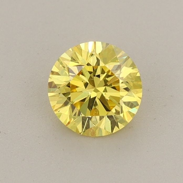 Loose Diamond - ROUND 0.49ct Fancy Vivid Yellow VVS2: Loose Diamond - ROUND 0.49ct Fancy Vivid Yellow VVS2 Source: This is a real non-mined Diamond that has been grown in a lab Shape: ROUND Carats: 0.49 Color: Fancy Vivid Yellow Certification: IGI