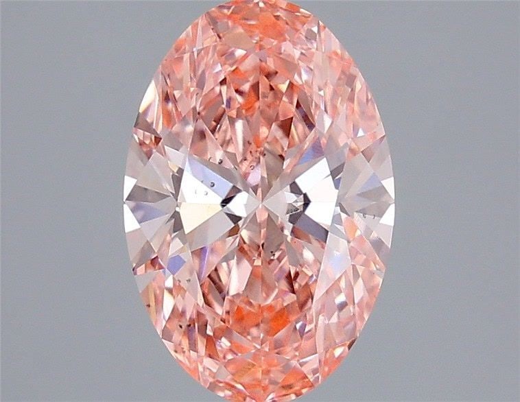 Loose Diamond - OVAL 2.2ct Fancy Vivid Pink VS2: Loose Diamond - OVAL 2.2ct Fancy Vivid Pink VS2 Source: This is a real non-mined Diamond that has been grown in a lab Shape: OVAL Carats: 2.2 Color: Fancy Vivid Pink Certification: IGI Video: