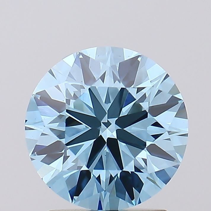 Ideal Loose Diamond - ROUND 1.83ct Fancy Vivid Blue VS1: Ideal Loose Diamond - ROUND 1.83ct Fancy Vivid Blue VS1 Source: This is a real non-mined Diamond that has been grown in a lab Shape: ROUND Carats: 1.83 Color: Fancy Vivid Blue Certification: IGI Video