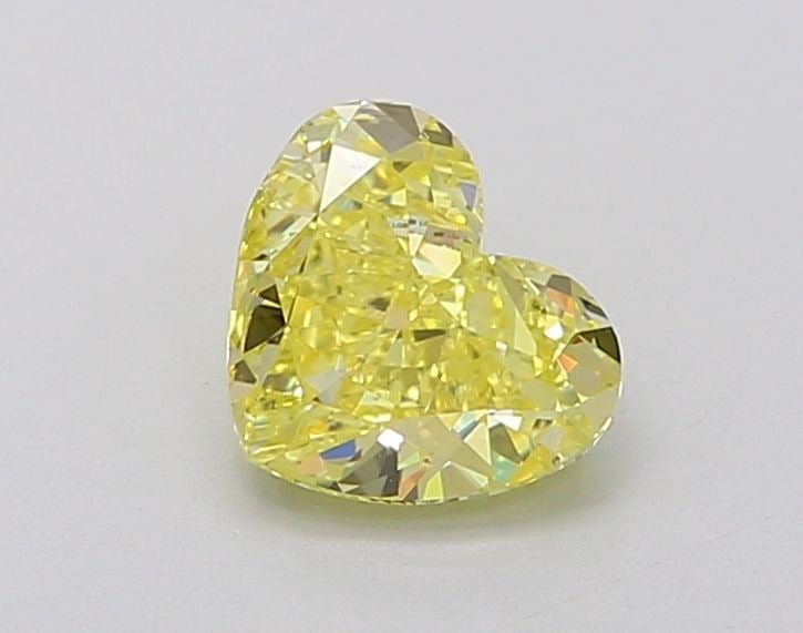 Loose Diamond - HEART 1.07ct Fancy Intense Yellow VS1: Loose Diamond - HEART 1.07ct Fancy Intense Yellow VS1 Source: This is a real non-mined Diamond that has been grown in a lab Shape: HEART Carats: 1.07 Color: Fancy Intense Yellow Certification: IGI Vid