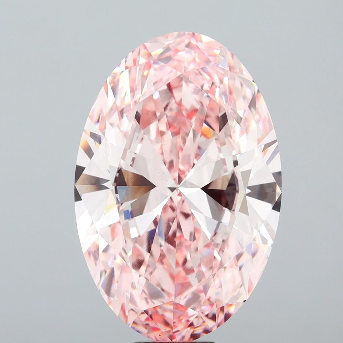 Loose Diamond - OVAL 20.79ct Fancy Intense Pink VS1: Loose Diamond - OVAL 20.79ct Fancy Intense Pink VS1 Source: This is a real non-mined Diamond that has been grown in a lab Shape: OVAL Carats: 20.79 Color: Fancy Intense Pink Certification: IGI Video: