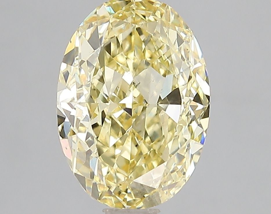 Loose Diamond - OVAL 3.0ct Fancy Intense Yellow VS2: Loose Diamond - OVAL 3.0ct Fancy Intense Yellow VS2 Source: This is a real non-mined Diamond that has been grown in a lab Shape: OVAL Carats: 3.0 Color: Fancy Intense Yellow Certification: IGI Video: